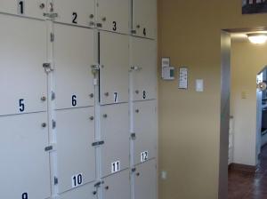 a row of lockers in a room with numbers on them at HI-Bonavista Hostel in Bonavista