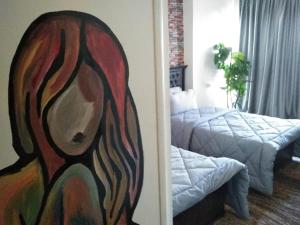 Ένα ή περισσότερα κρεβάτια σε δωμάτιο στο Castle Hostel