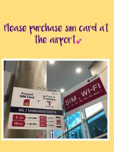 a sign that says release purchase sim card at the airport at Hanok Guesthouse Suni in Seoul