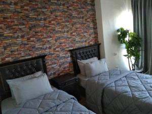 Ένα ή περισσότερα κρεβάτια σε δωμάτιο στο Castle Hostel