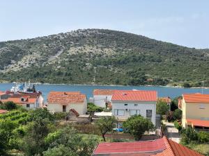 a view of a town and a body of water at Villa Danmarie in Vinišće