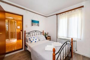 Posteľ alebo postele v izbe v ubytovaní Vacation house Anna