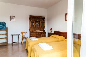 Llit o llits en una habitació de Torre Ancinale