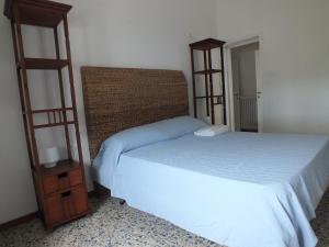 A bed or beds in a room at Villa Mattera