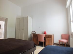 A bed or beds in a room at Villa Mattera