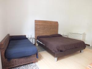 A bed or beds in a room at Villa Mattera