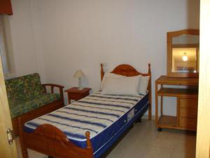 Posteľ alebo postele v izbe v ubytovaní Apartamento 2 hab.en El Parador
