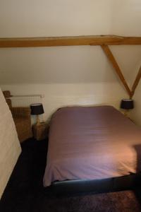 Voodi või voodid majutusasutuse Holiday Home Bonjour Clara toas
