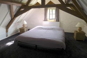 Voodi või voodid majutusasutuse Holiday Home Bonjour Clara toas
