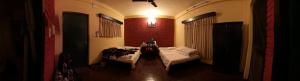 Voodi või voodid majutusasutuse Planet Bhaktapur Hotel toas