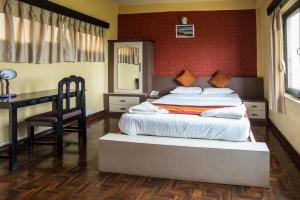 Voodi või voodid majutusasutuse Planet Bhaktapur Hotel toas
