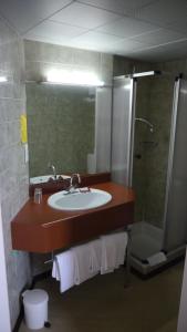 Koupelna v ubytování Hôtel Royal