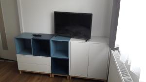 TV i/ili multimedijalni sistem u objektu Apartmán Relax Hamry
