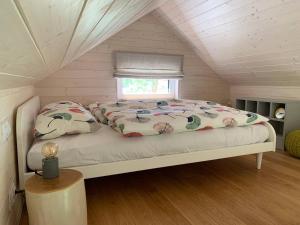 Postel nebo postele na pokoji v ubytování Tiny Vacation