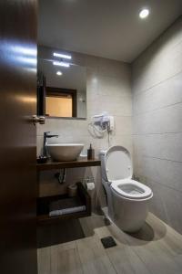 Koupelna v ubytování D'Argento Boutique Rooms + 37 fotografií