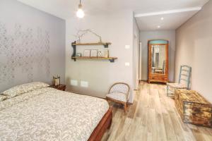 Posteľ alebo postele v izbe v ubytovaní Happy hill - appartamento Bambù- natura e relax