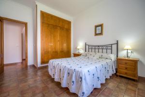 Łóżko lub łóżka w pokoju w obiekcie Chalet Miriam II
