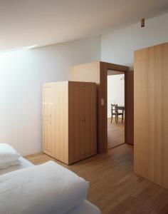 Ένα ή περισσότερα κρεβάτια σε δωμάτιο στο Hotel Gasthof Grüner Baum