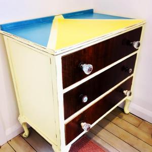 a yellow and blue dresser with drawers at Storm in a tea cup in St Ives
