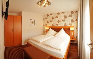 Postel nebo postele na pokoji v ubytování Hotel Nothwang