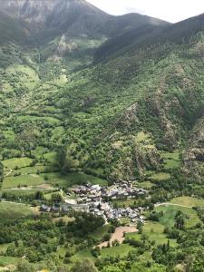 an aerial view of a village in the mountains at Acogedora casita en el Pallars in Isil