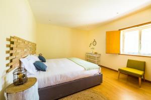 Ένα ή περισσότερα κρεβάτια σε δωμάτιο στο Casa de Campo - Olive House +25 φωτογραφίες