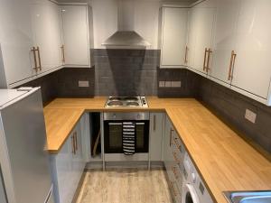Kjøkken eller kjøkkenkrok på The Croft Apartment