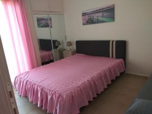 Postel nebo postele na pokoji v ubytování Eirini's Place