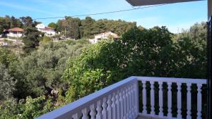 a view from the balcony of a house at STERNES house in Agios Leon