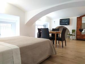 Posteľ alebo postele v izbe v ubytovaní Casa Rossini