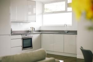 A cozinha ou cozinha compacta de Authentic Battersea Experience