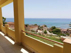 a balcony with a view of the ocean at Villa Fiorella in Sciacca