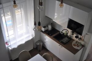 Kuchyň nebo kuchyňský kout v ubytování Apartments Home2 Zagreb