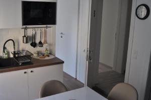 Kuchyň nebo kuchyňský kout v ubytování Apartments Home2 Zagreb