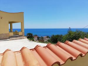 a view of the ocean from the roof of a house at Villa Fiorella in Sciacca
