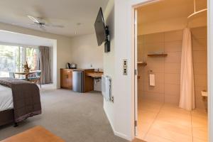 A kitchen or kitchenette at Taipa Beach Resort