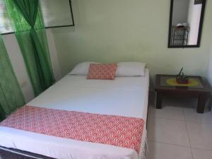 Postel nebo postele na pokoji v ubytování Hotel B & C