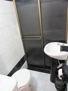 Koupelna v ubytování Hotel B & C