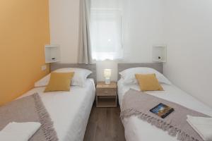 Postel nebo postele na pokoji v ubytování Villa Honey + 37 fotografií