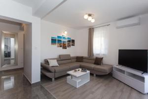 TV a/nebo společenská místnost v ubytování Villa Honey