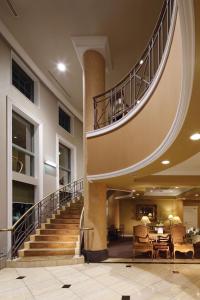 a spiral staircase in a building with a lobby at Hotel Quest Shimizu in Shizuoka