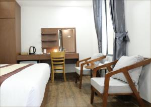 Postel nebo postele na pokoji v ubytování DORADO HOTEL