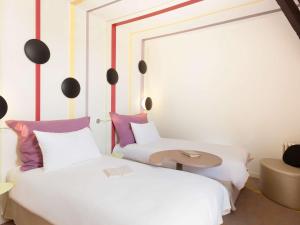 Postel nebo postele na pokoji v ubytování ibis Styles Bayonne