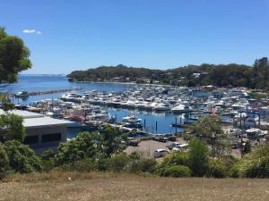 a harbor filled with lots of boats in the water at Broughton Views in Corlette