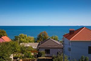 a view of the ocean from a house at Apartamenty Terrasa in Chornomorsk