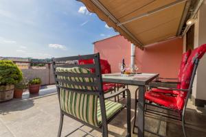 En balkon eller terrasse på Margaret Apartment for 5 people with Panorama Terrace