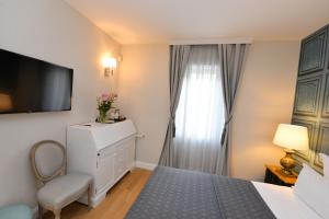 TV a/nebo společenská místnost v ubytování The Duke luxury rooms