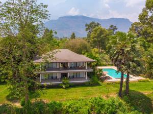 an aerial view of a villa with a swimming pool at The River Resort in Champasak