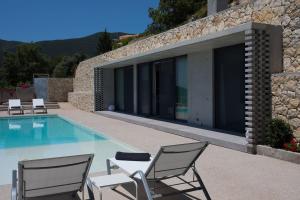 Πισίνα στο ή κοντά στο Villa Fyki