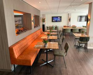 TV i/ili multimedijalni sistem u objektu Golden Tulip Zoetermeer - Den Haag